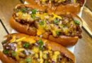 Delicious chili cheese coneys with Hawaiian hot dog buns